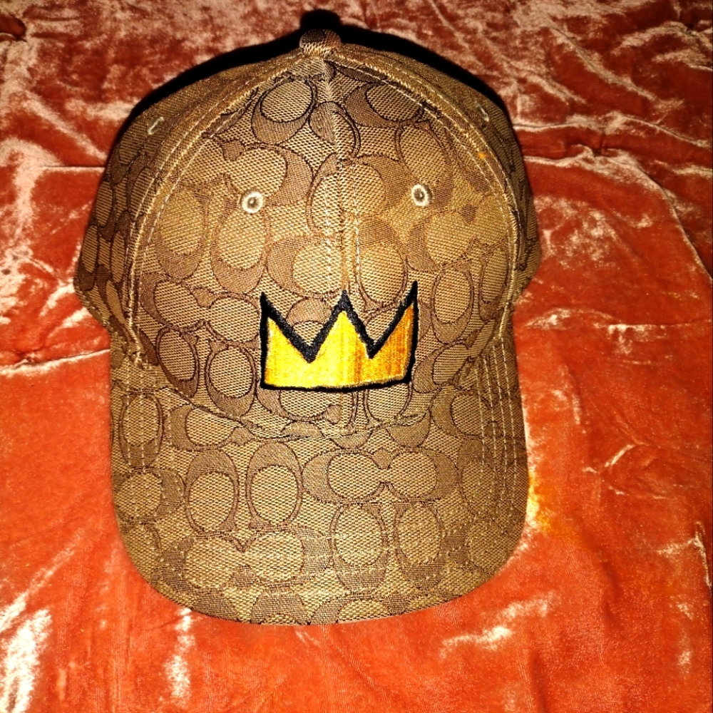 Brown baseball cap with queen logo(brand new)